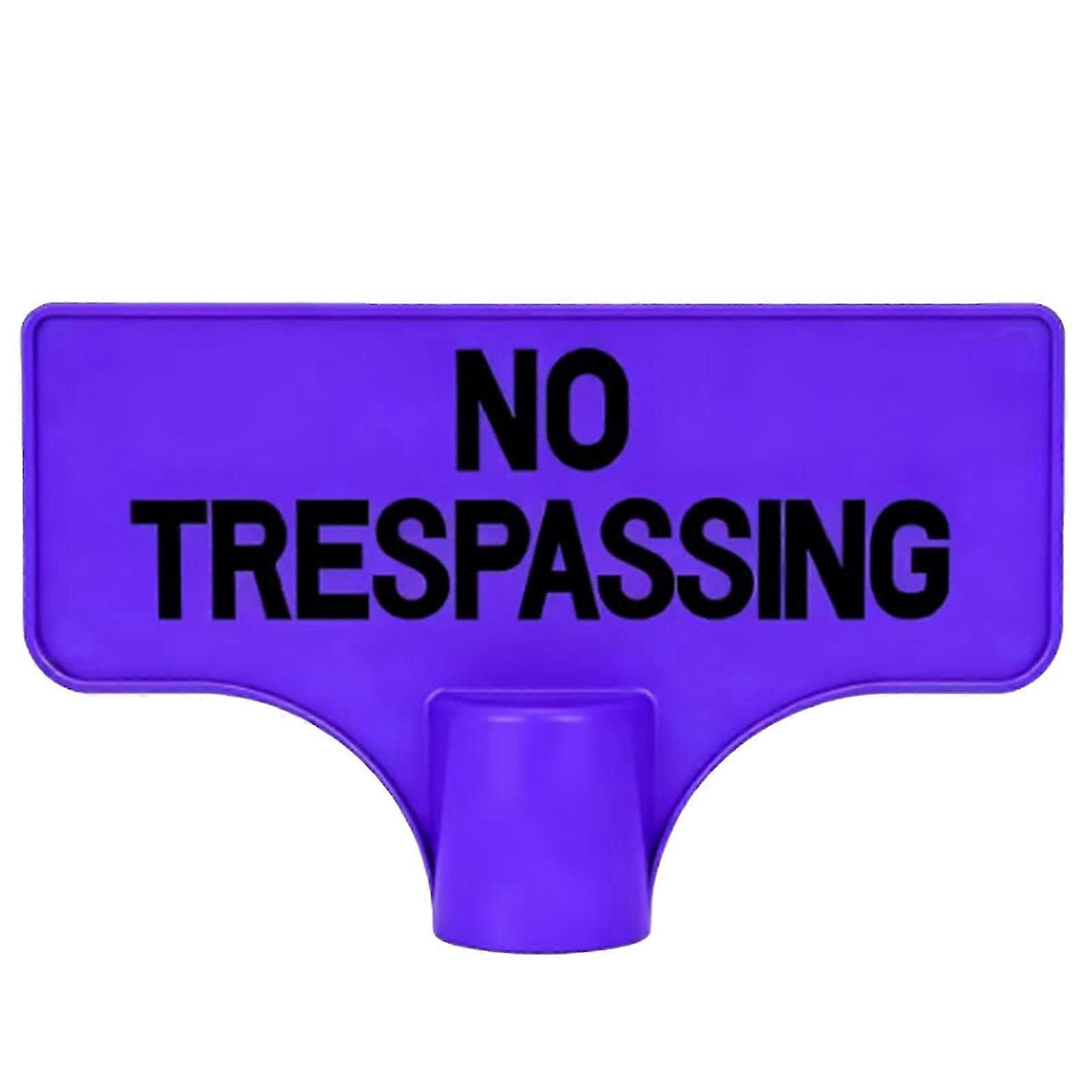 Orange Purple No Trespassing Sign