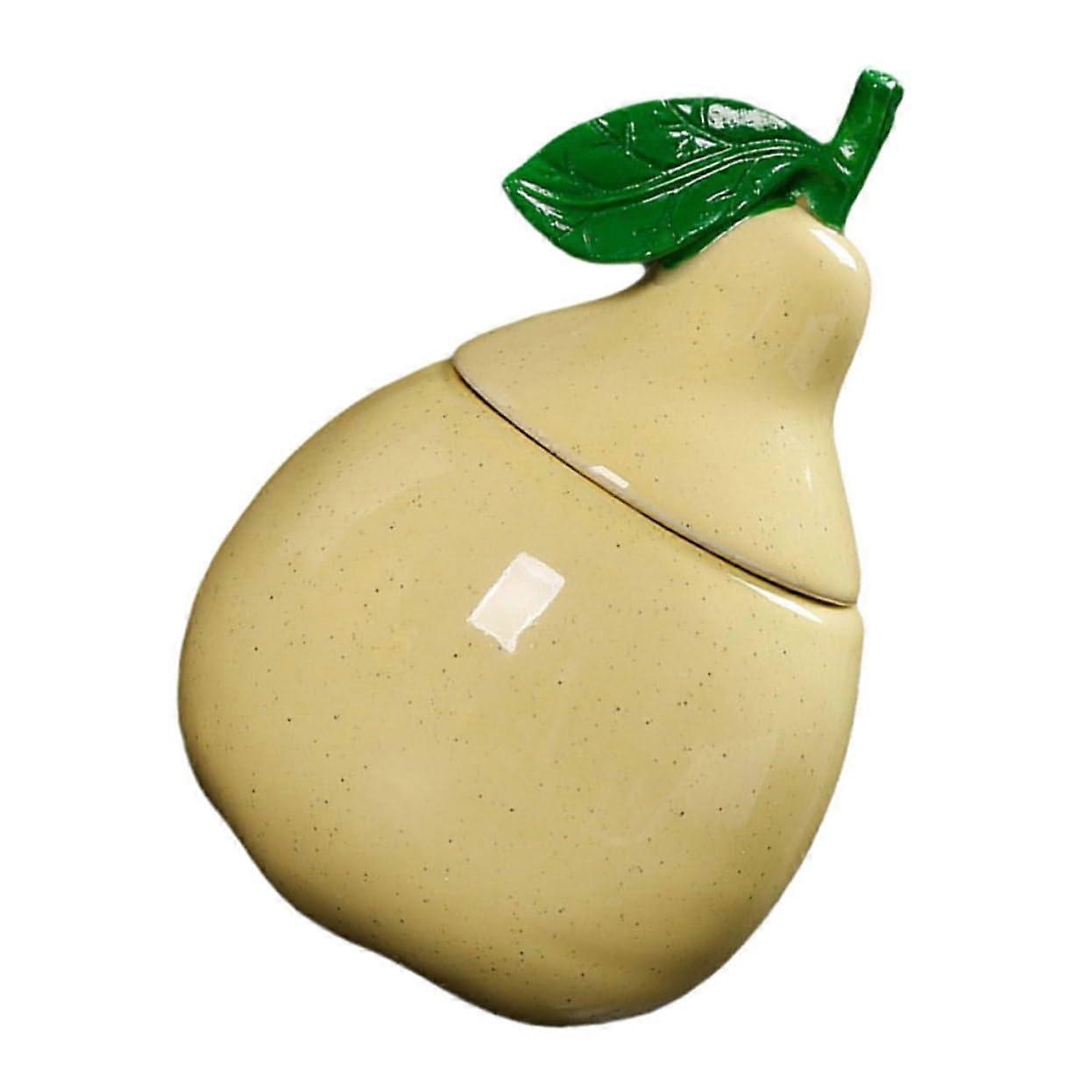 Ceramic pearshaped tea canister with lid, airtight for tea and flour.
