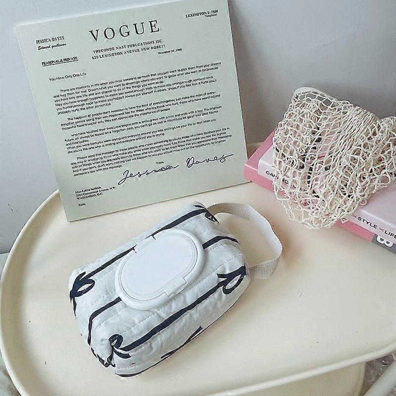 Striped bow quilted cotton wet wipes bag with handle, flip-top, pull-out design.