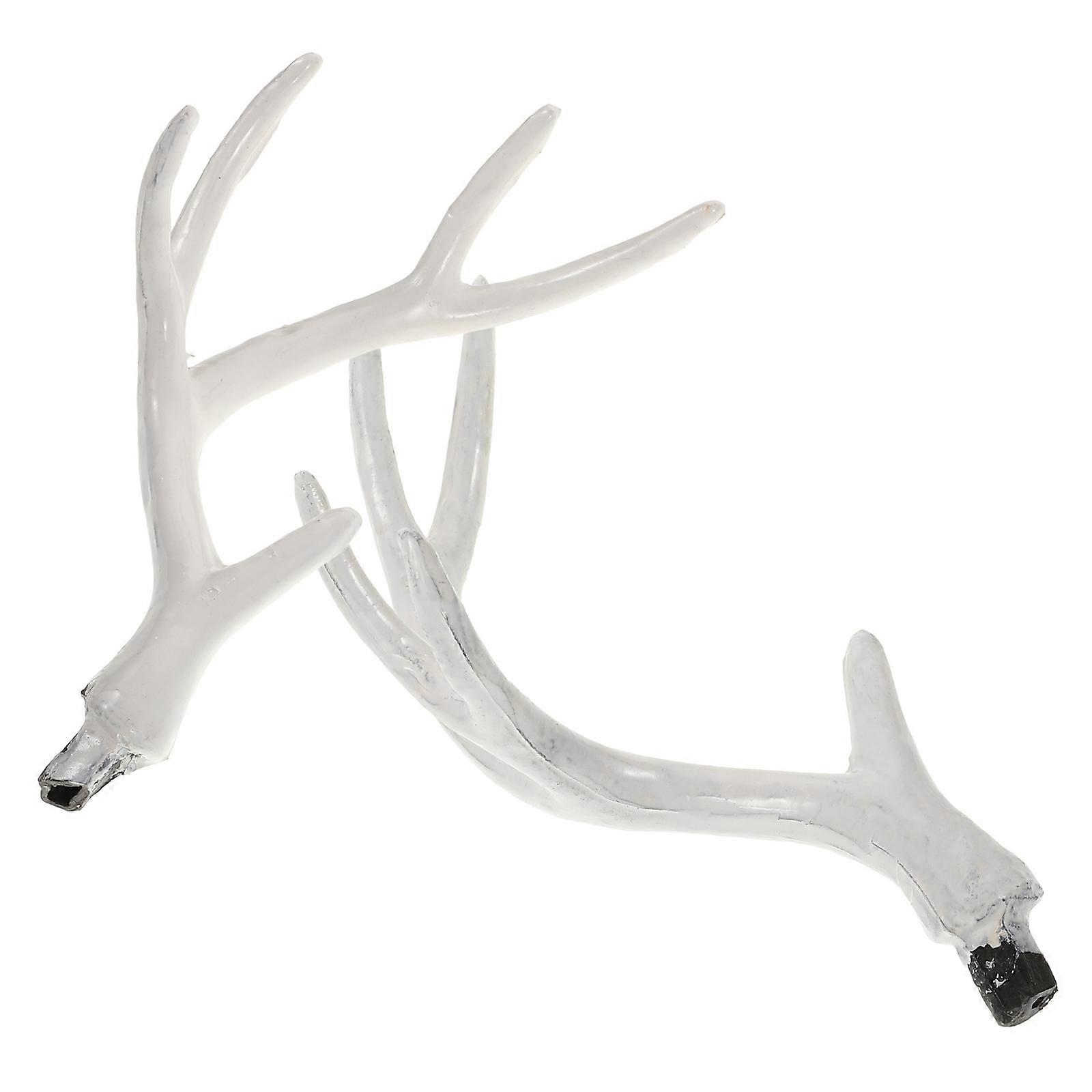 a polished and engaging product description based on your input:
**1 Pair of Artificial White Deer Antlers Faux Horns for Christmas Cosplay,
