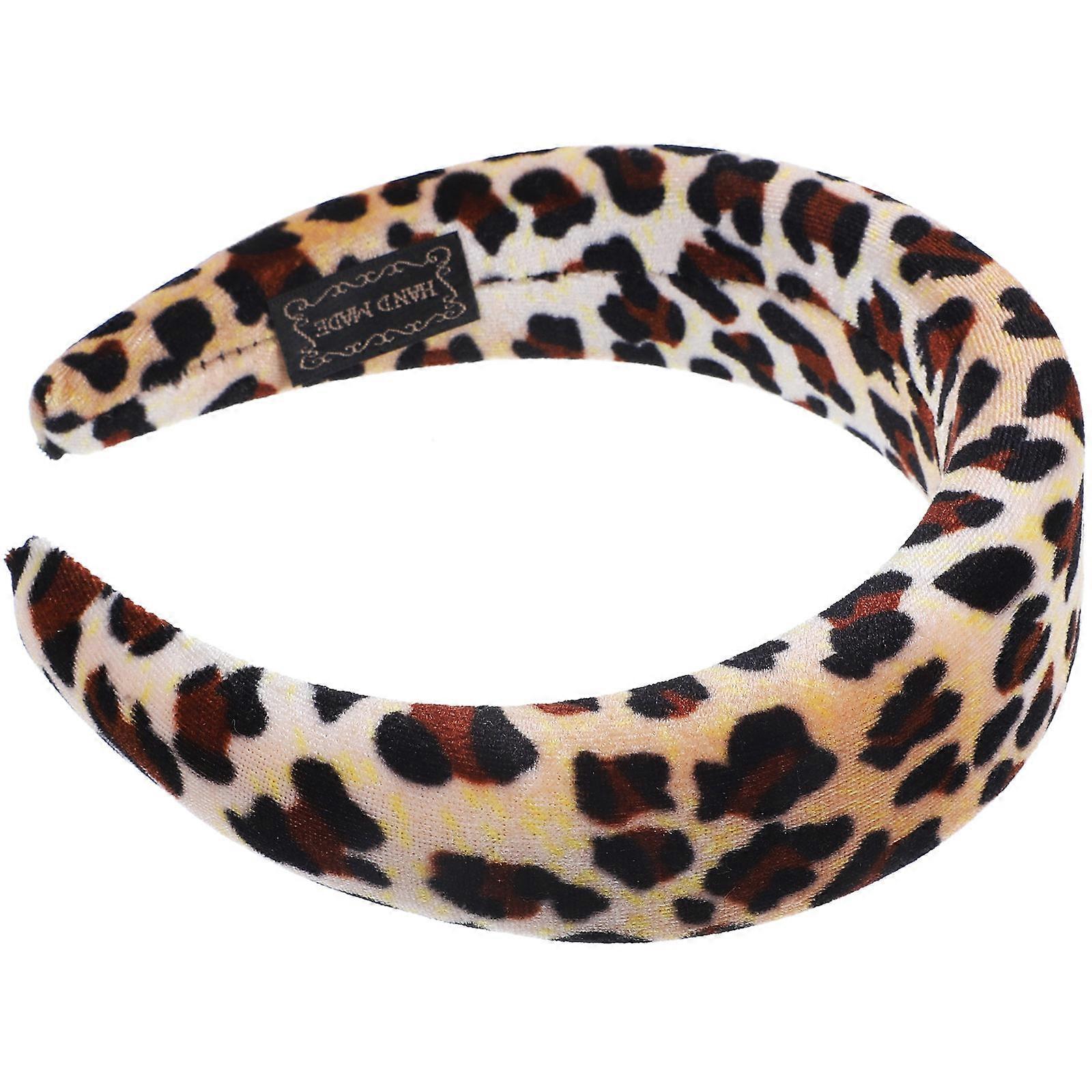 Here's a polished and professional product description based on the title you provided:
**Leopard Headband for Women – Stylish & Comfortable Hair