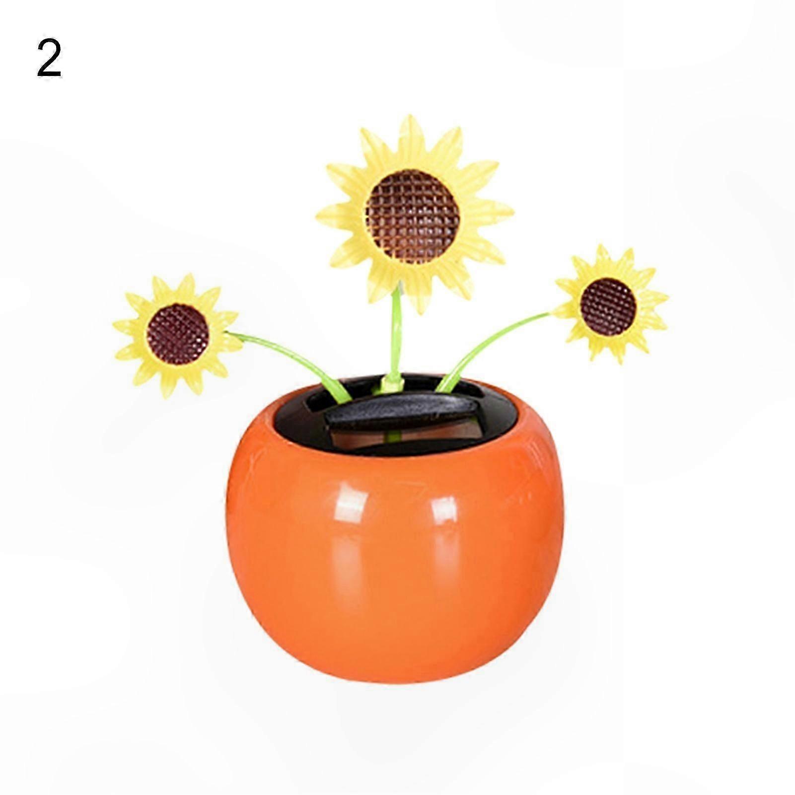 車のダッシュボードやホームギフトのアイデアのための花のソーラーデコレーション