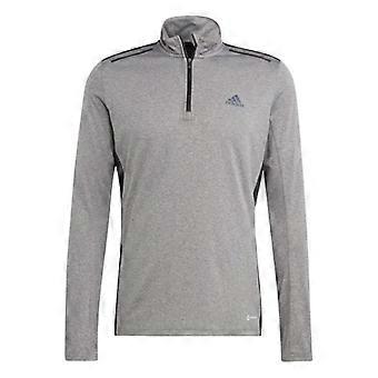 Jaqueta esportiva masculina Adidas com zíper frontal até o peito e mangas compridas, modelo slim.