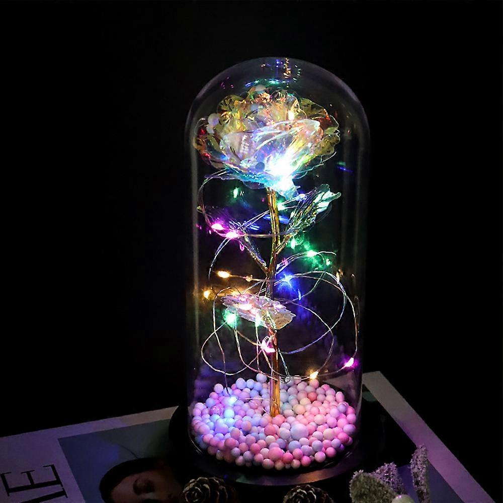 White Iridescent Rose in Snow Globe with LED Lights and Black Plastic Stand