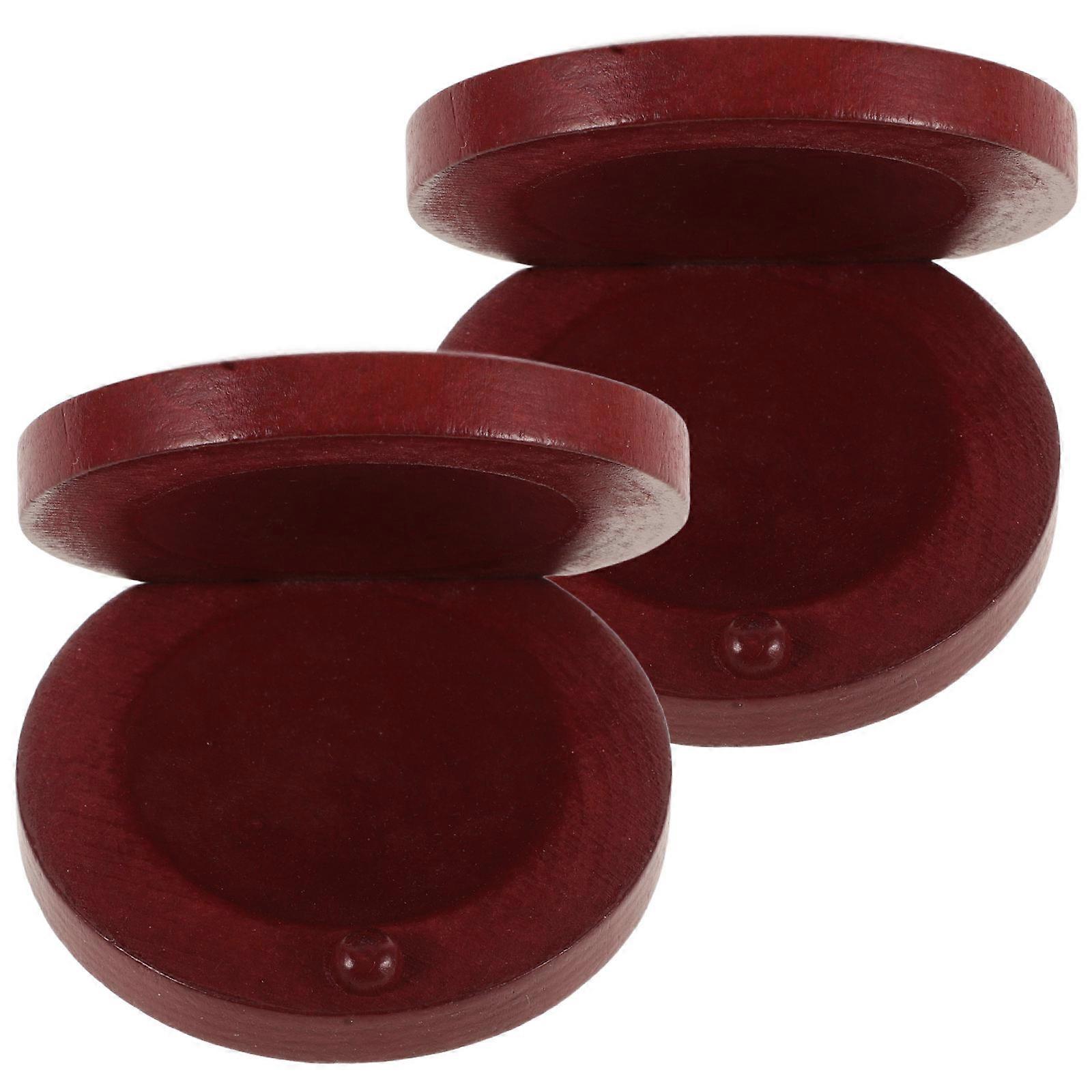 It looks like you're referring to a product listing for **wooden finger castanets**—a fun and simple percussion instrument often used in music