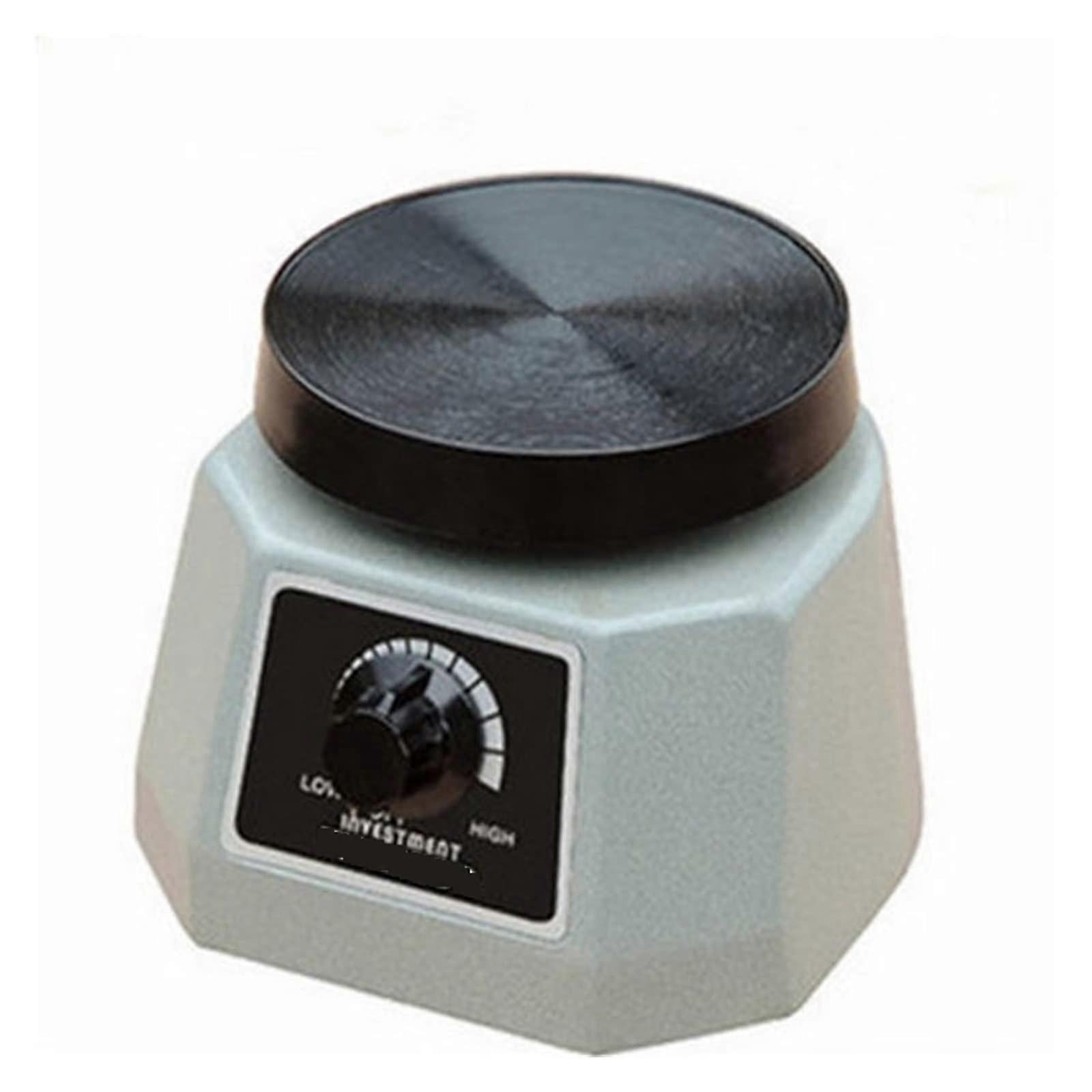 Dental plaster vibrator, round, small, with variable intensity, oscillator, dental laboratory equipment for efficiency and precision.