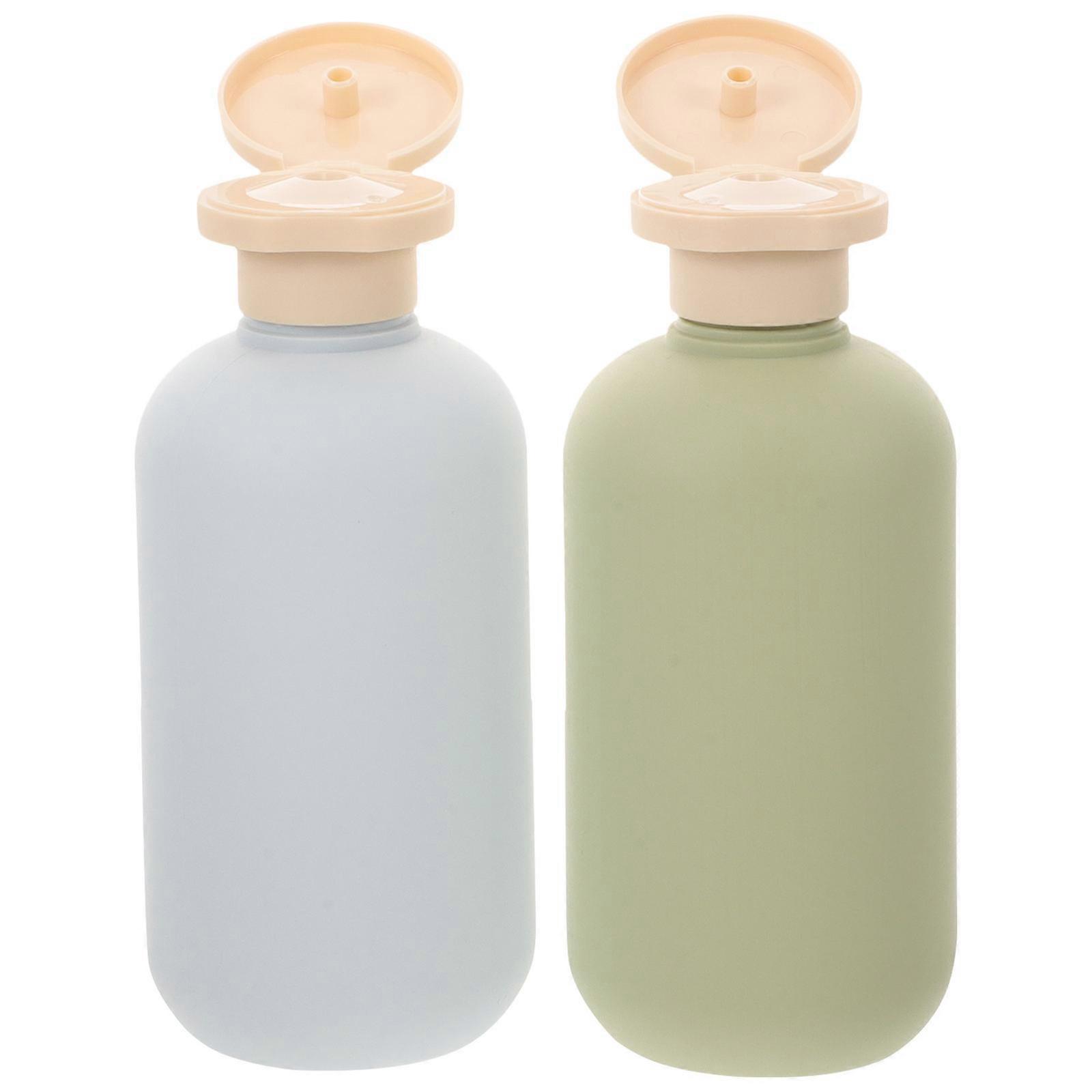 a polished and professional product description based on your input:
**2PCS Travel Toiletries Bottles – Portable Shampoo & Conditioner