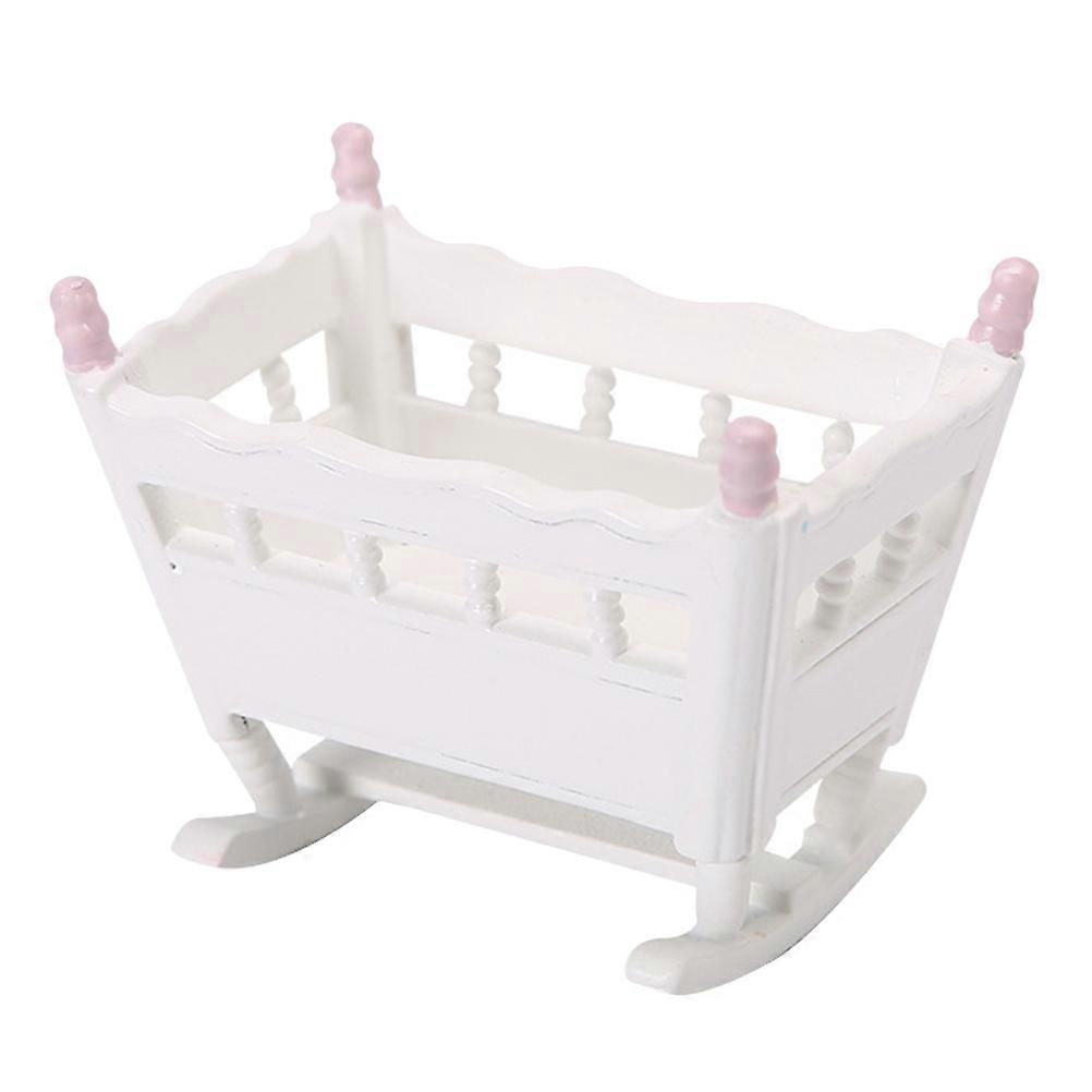It seems like you're describing a product listing for a **miniature doll crib or cradle** intended for use in dollhouse bedroom scenes. Here's a