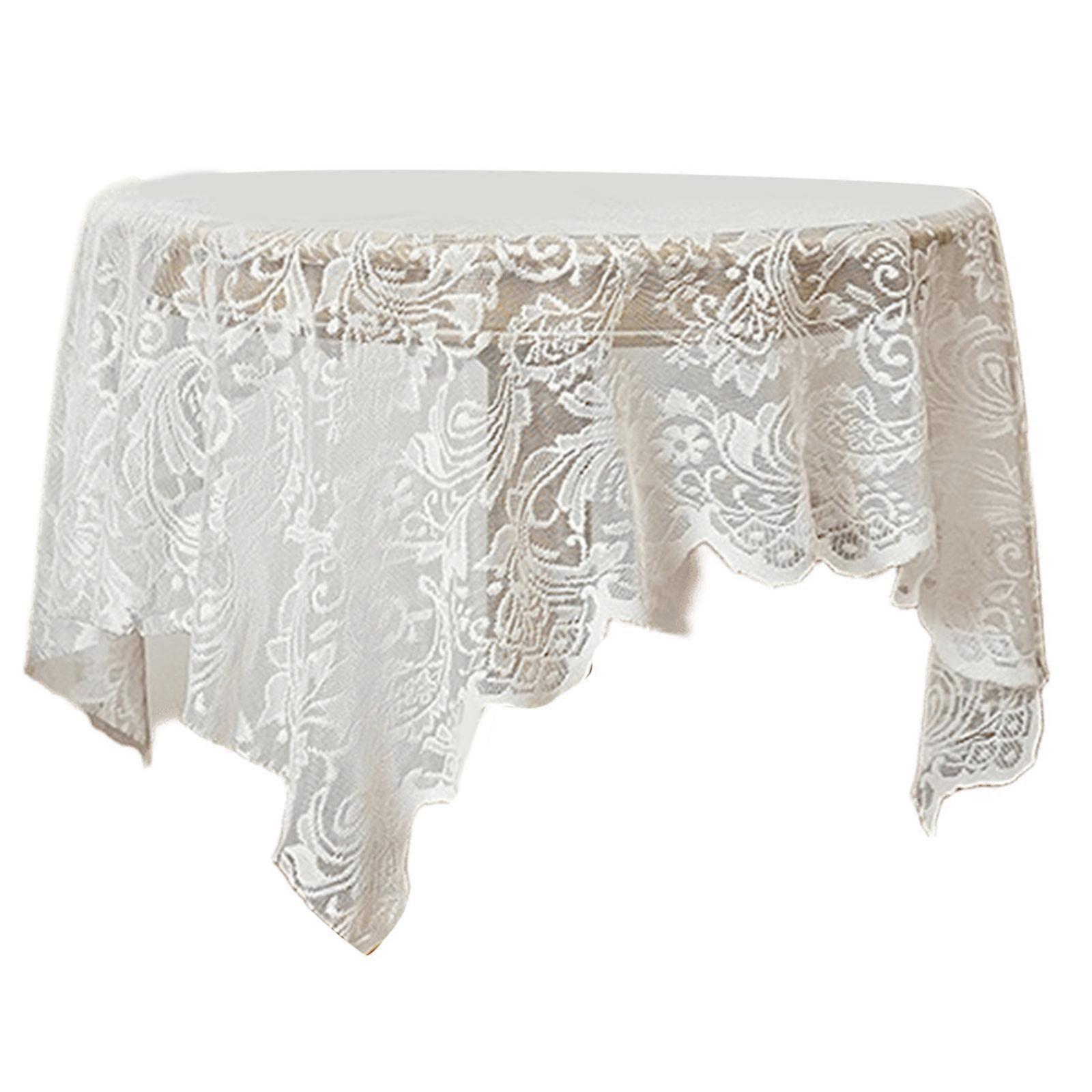 Nappe en polyester infroissable à motifs ajourés délicats, idéale pour les repas décontractés ou formels (blanche).