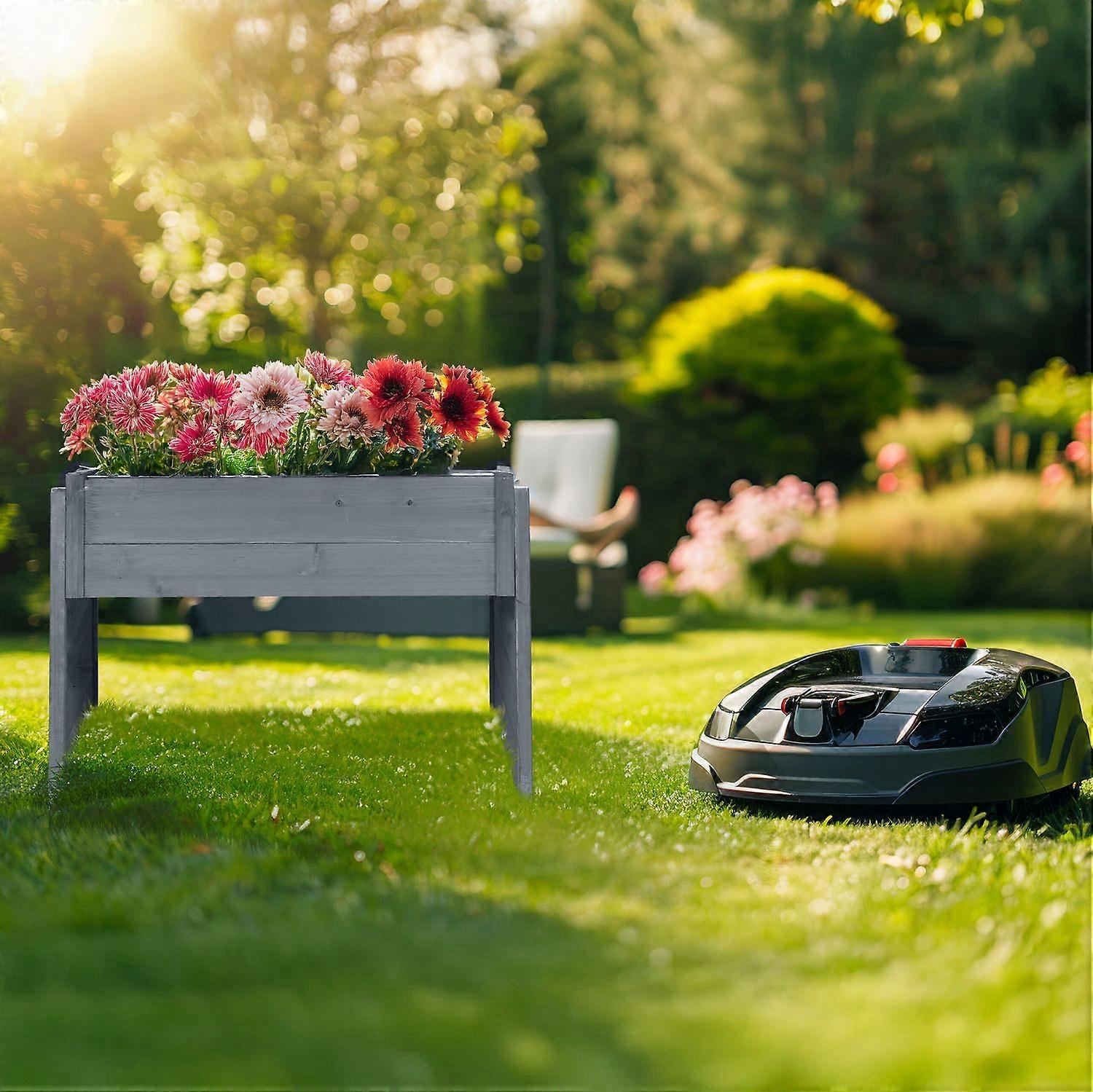 Robotic lawnmower garage with planting bed