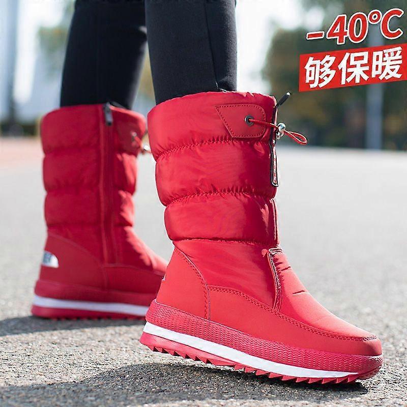 Paksut, lämpimät ja liukumattomat naisten plus-koon puoliväliin ulottuvat lumikengät