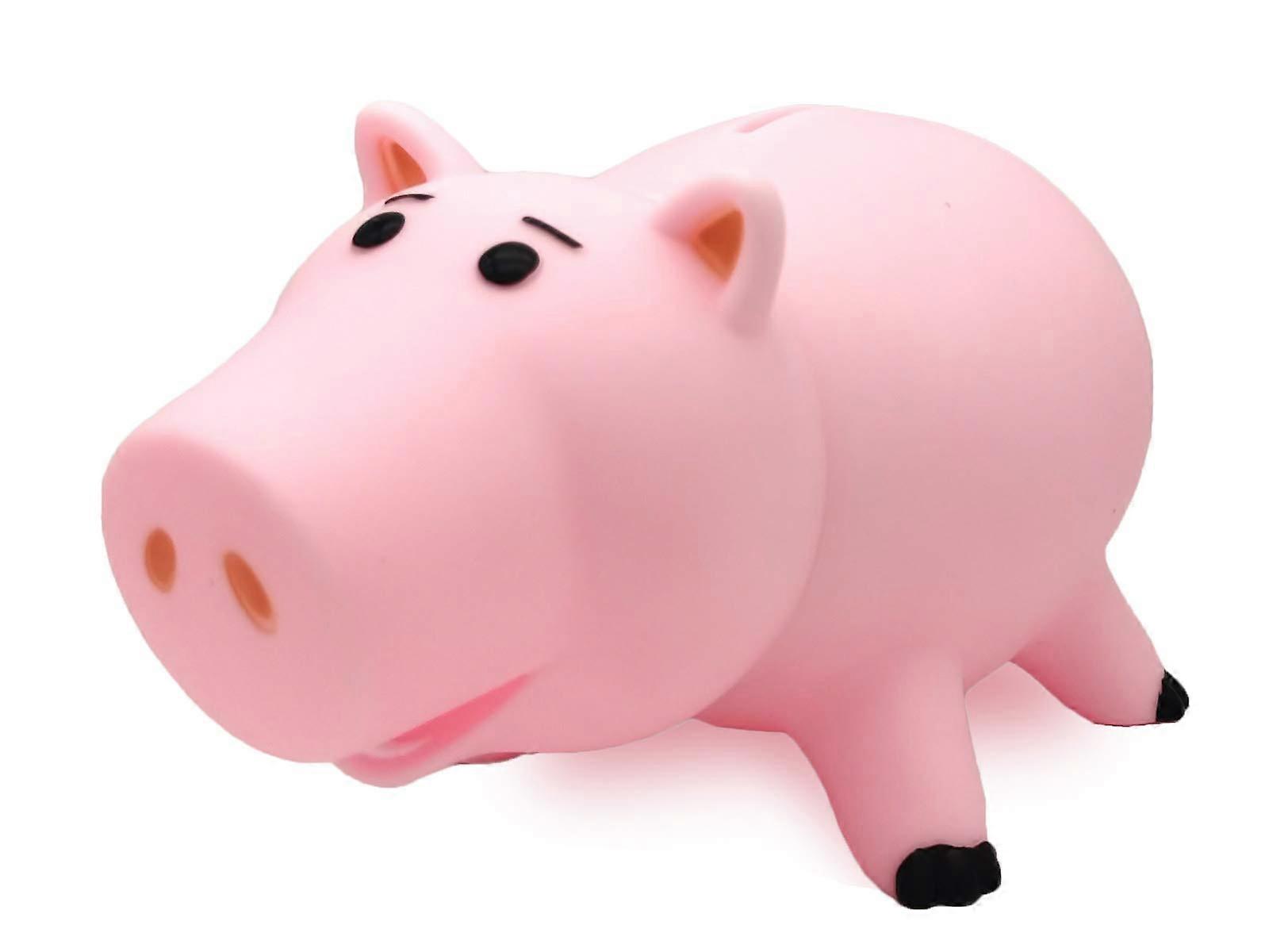 ピンクのプラスチック貯金箱、色付きのパッケージ、男の子、女の子、子供のための完璧なおもちゃのギフト。