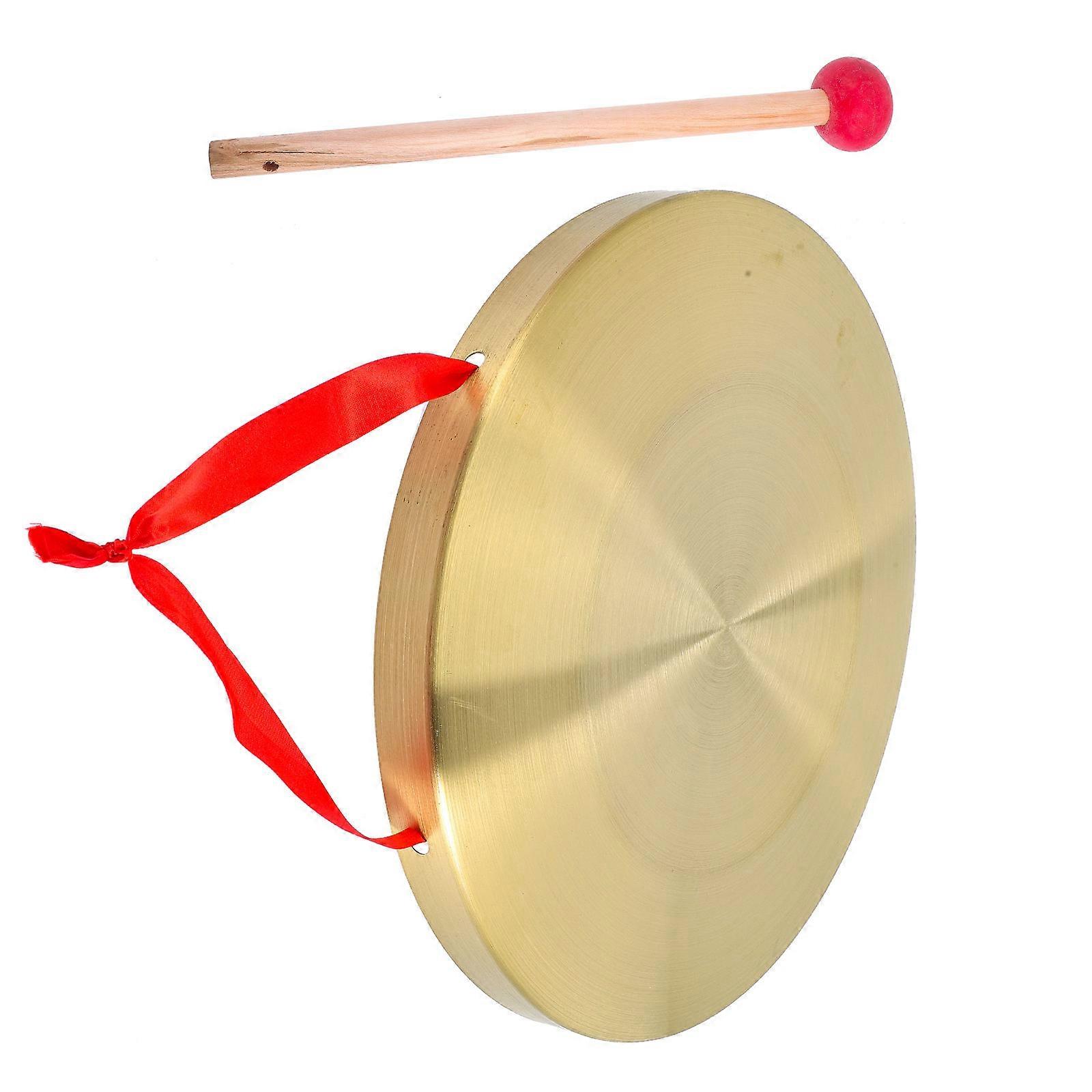 The **Portable Multi Functional Copper Gong With Hammer** is a versatile and handheld percussion instrument crafted from durable copper. Designed for