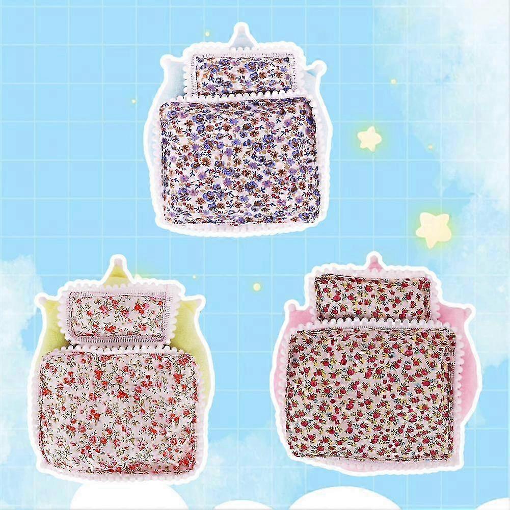 A 3-piece accessory set for a 17cm mini Labubu doll, including a bed, a quilt, and a pillow.