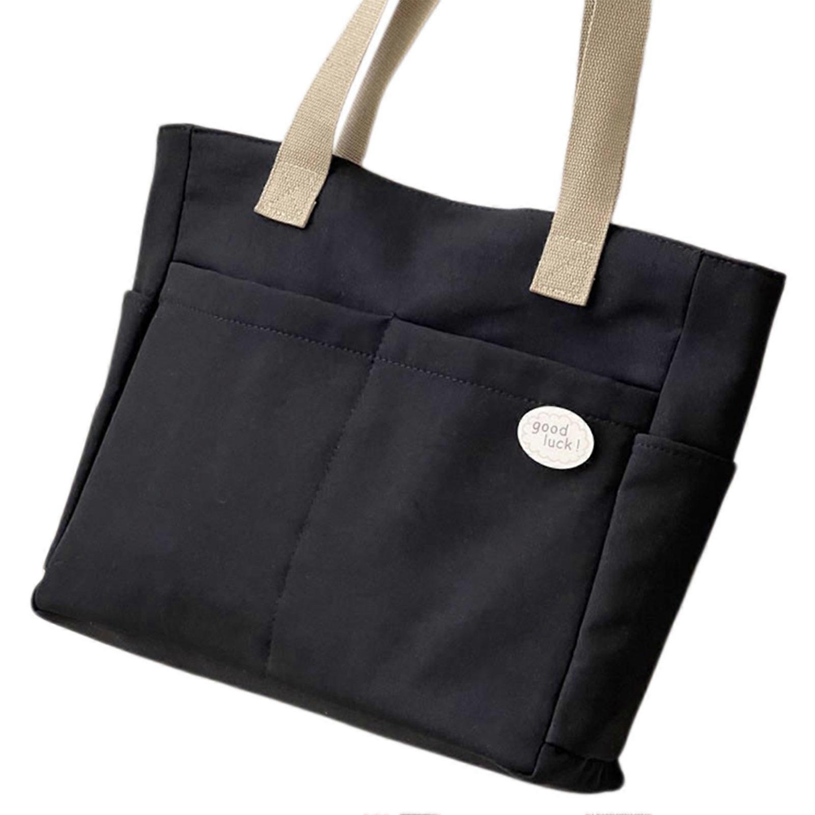 Large Sturdy-canvas tote with zipper closure Secure zipper keeps valuables safe. Casual Life-style