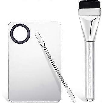 This three-piece stainless steel makeup palette set includes a makeup palette, foundation, makeup stick, and a reusable facial cosmetic spatula.