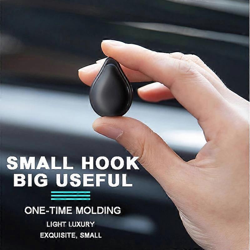 רכב מיני מחזיק אטם אוזניים וו מפתח פשוט בלתי נראה קסדה קטנה וו מטען הדבקה יצירתית מוצרי פנים לרכב