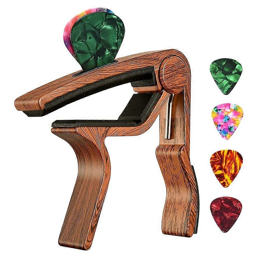Gitarrcapo och 4 gitarrplektrum för akustisk elgitarr ukulele
