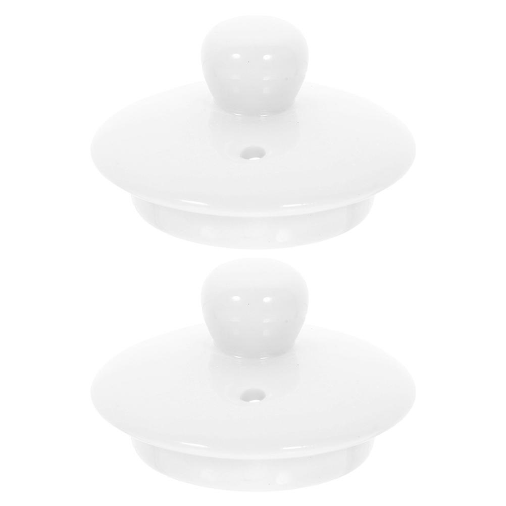 Here's a polished and professional product description based on your input:
**2pcs Ceramic Tea Cup Replacement Lids – Polished Teapot Covers for