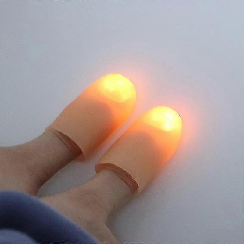 Lumières LED pour les doigts des enfants - 2 accessoires de magie avec les pouces clignotants