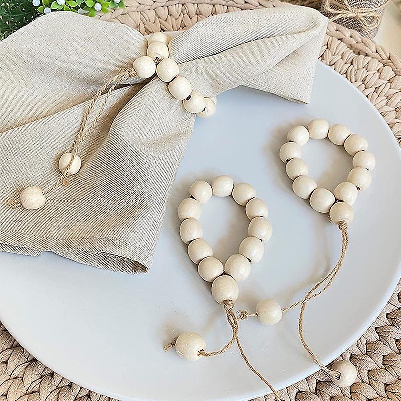Set mit 12 Holzperlen-Serviettenringen Naturperlen