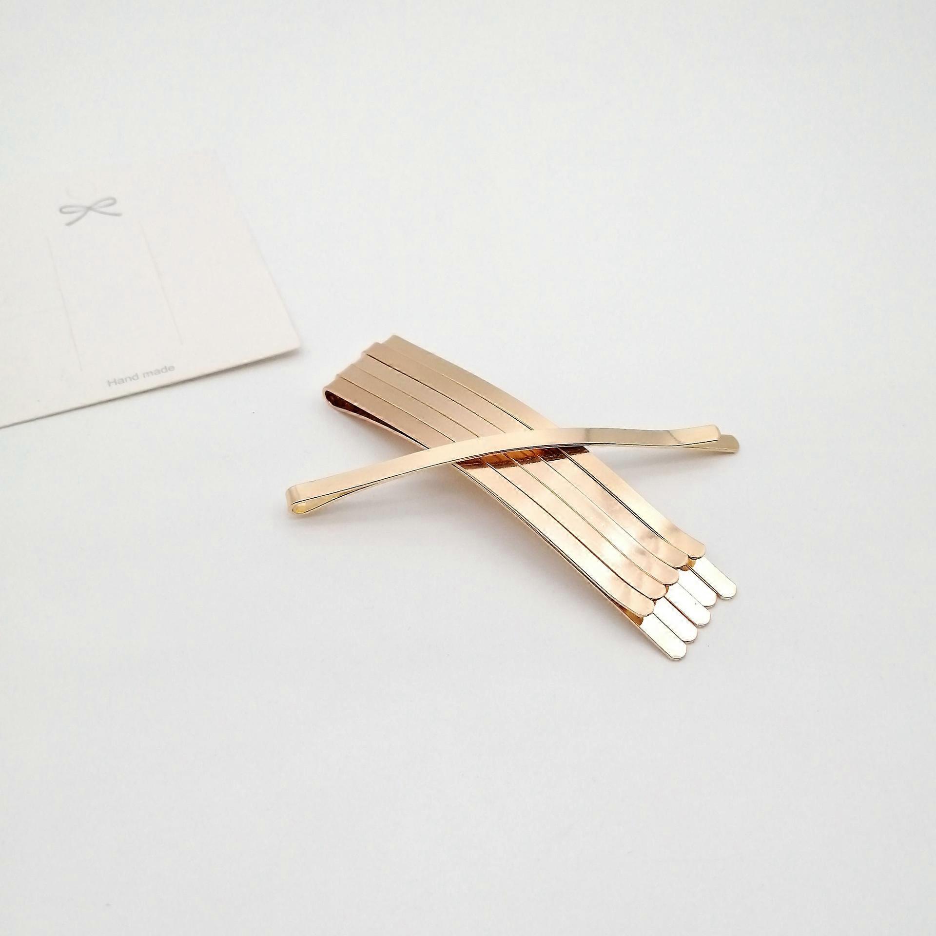 Set 50 de agrafe par. Auriu