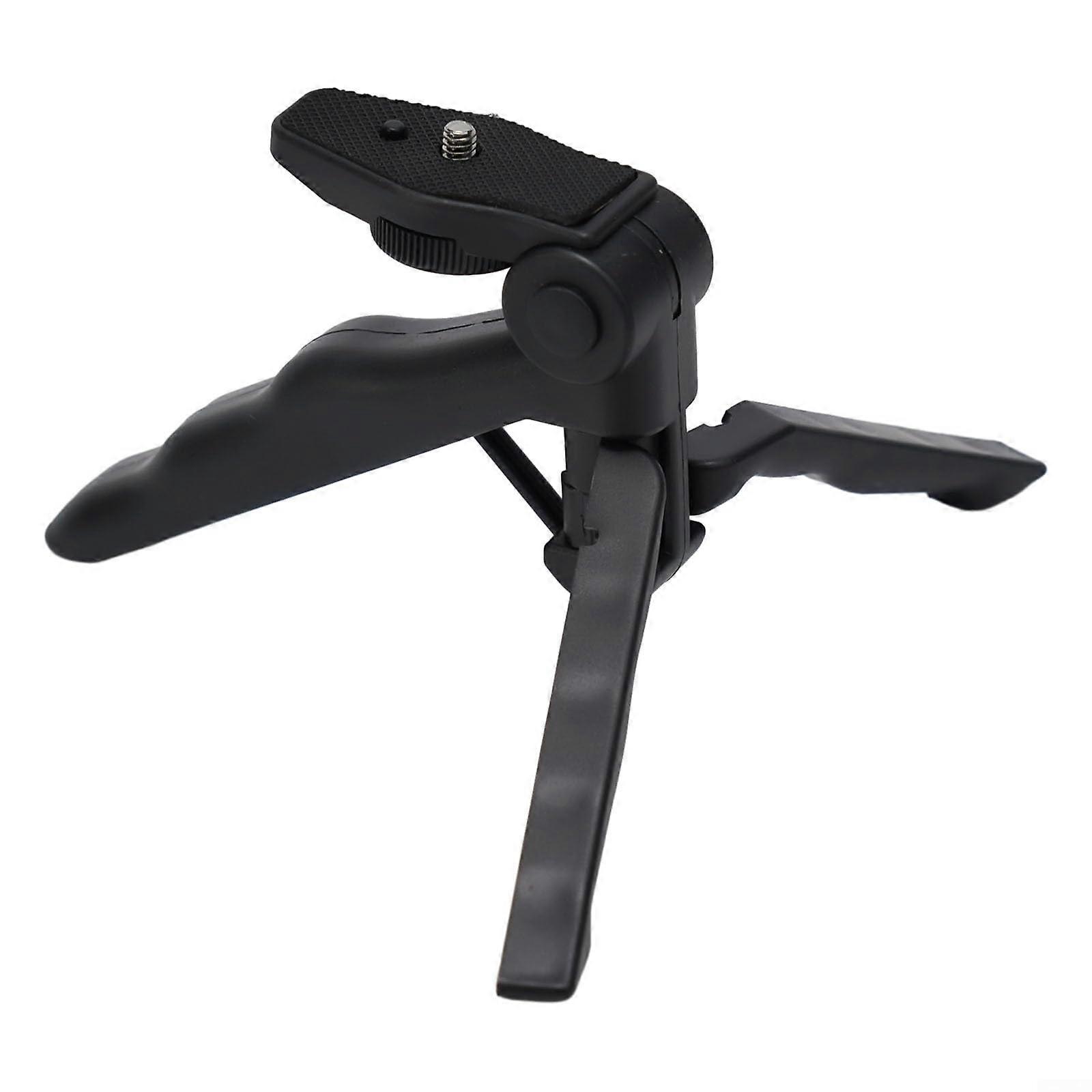 Adjustable mini tripod with pistol grip, ideal for phones and cameras, for content creators.