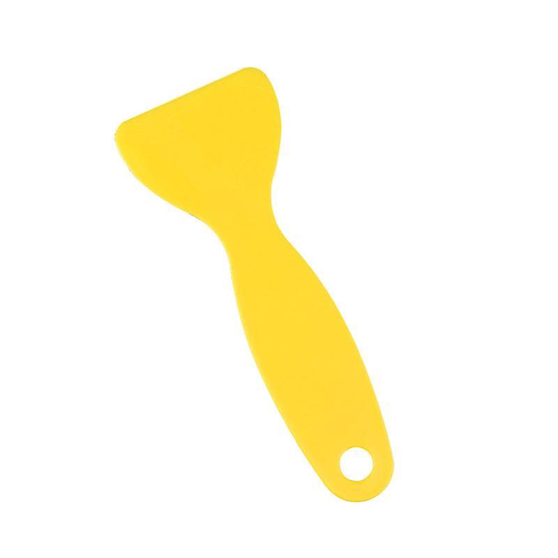 auton ikkunakalvo pieni kaavin keltainen kolmiokaavin pieni kaavin pieni keltainen lapio auto kauneuskauppa elokuvakaavin