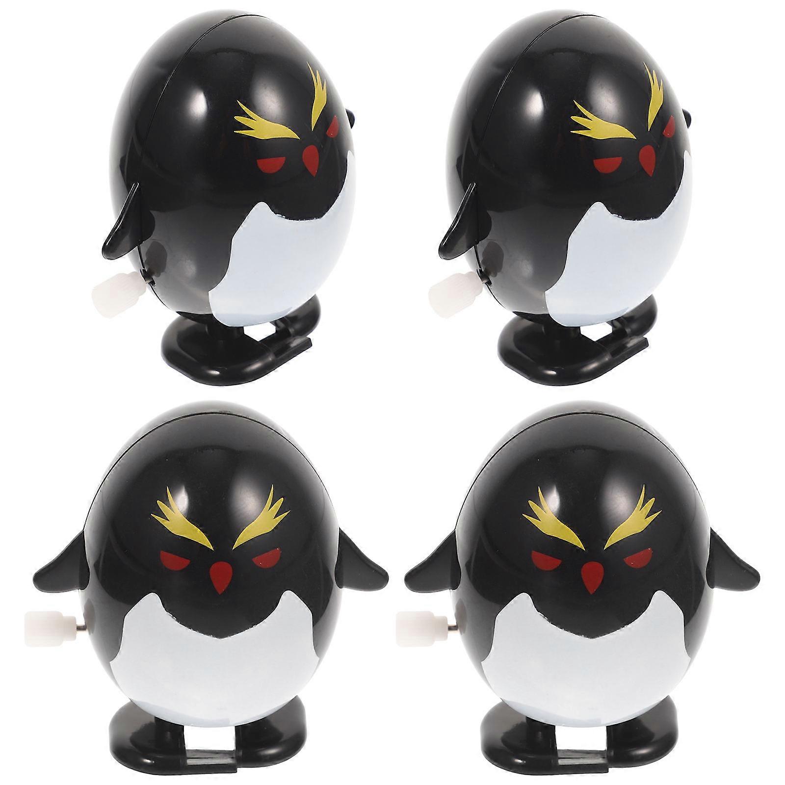 Miniature Wind Up Toys Penguin Shape for Kids Party Plastic with Jumping Function 4Pcs