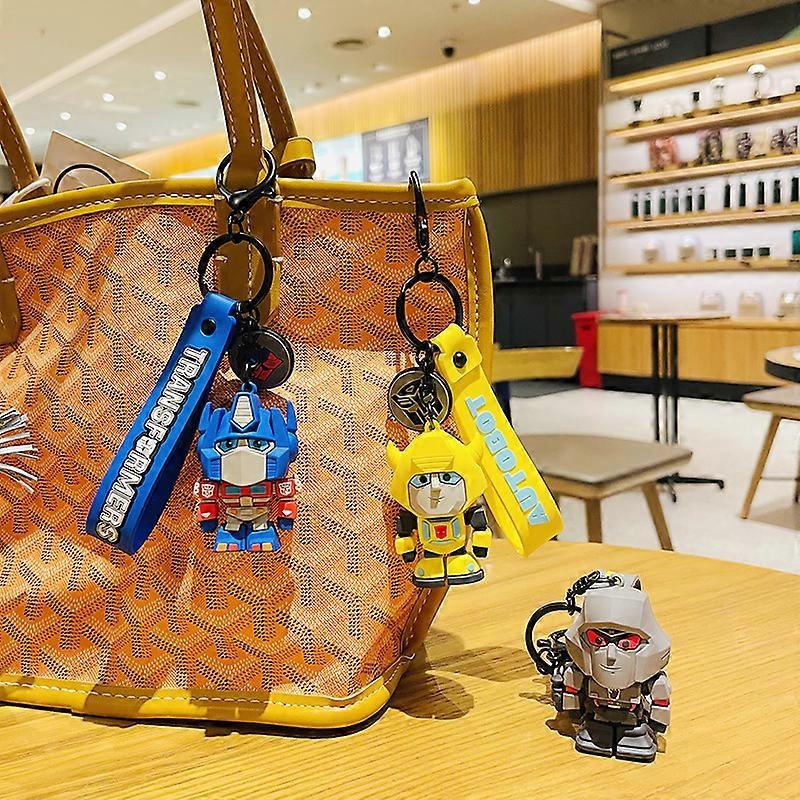 Cartoon Movie Transformer Key Chain Optimus Prime bumblebee robot Key Chains Silicone Car Key Chain Bag Pendant Keyring Friends