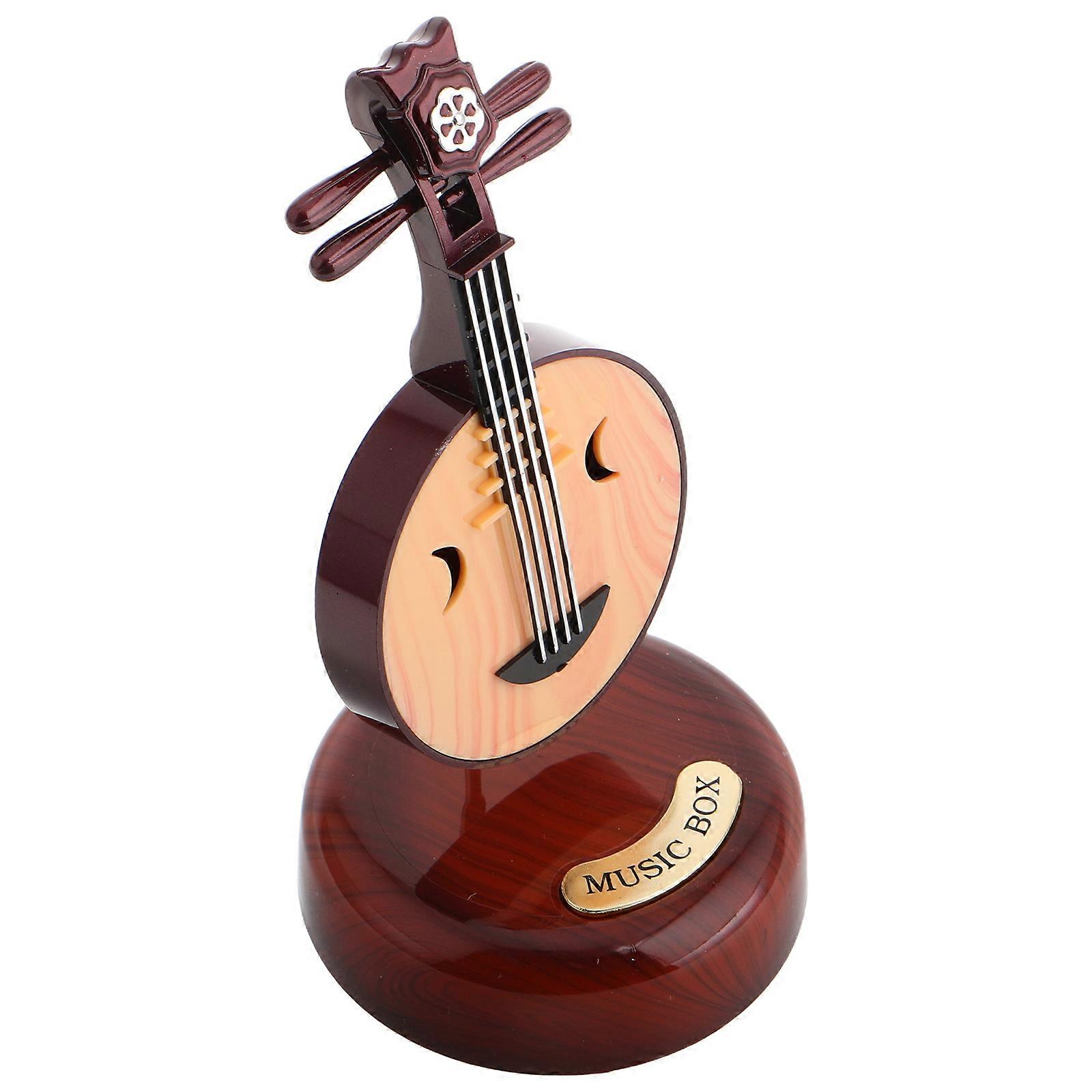 Here's a polished and professional product description for the **Vintage Wooden Zhongruan Music Box**:
**Vintage Wooden Zhongruan Music Box –