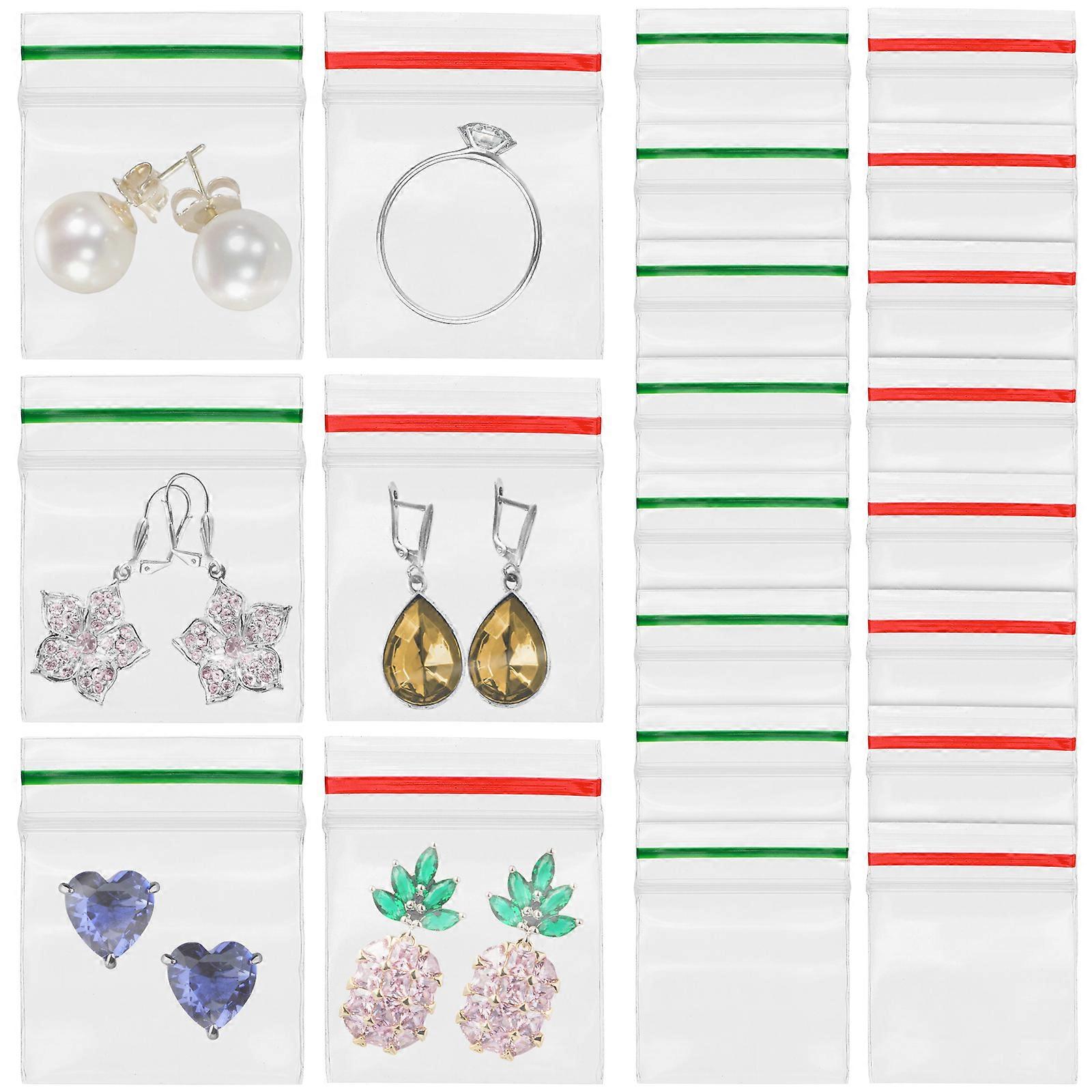 6 عبوات / 600 قطعة أكياس صغيرة حقيبة حبوب منع الحمل حقيبة تخزين ذاتية الختم حقيبة حزمة مقاومة للغبار حقيبة آمنة مختومة لحبوب منع الحمل (حافة حمراء وخضراء)