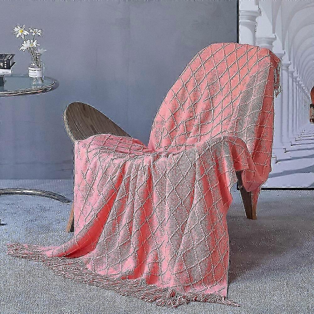 Sofa throw blanket with weighted feel and textured knitted fabric