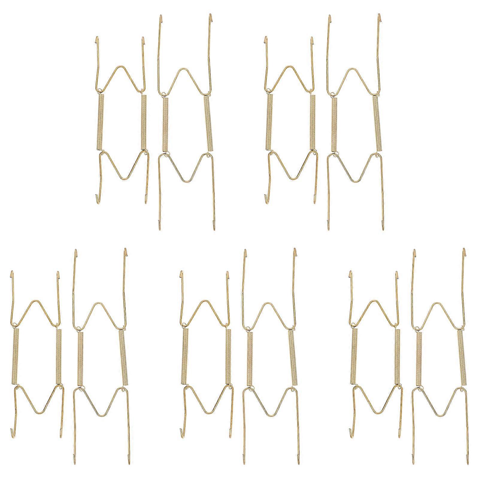 Here's a polished product description for your **10pcs Shaped Decorative Plate Hangers with Invisible Spring Hooks**:

 

**10pcs Shaped Decorative