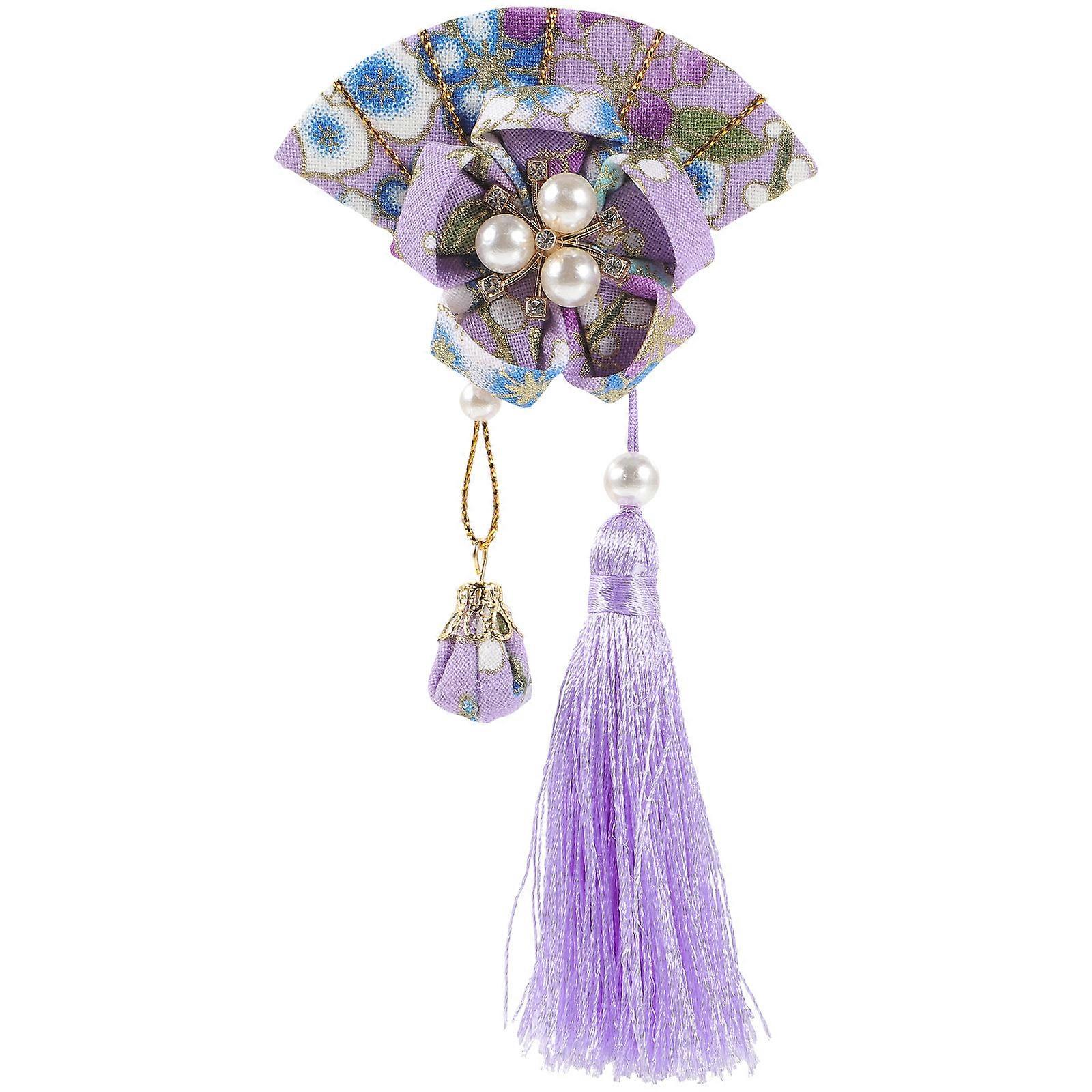 It sounds like you're describing a **Japanese fan hairpin with tassel**, a beautiful and elegant accessory often used for **cosplay, festivals,