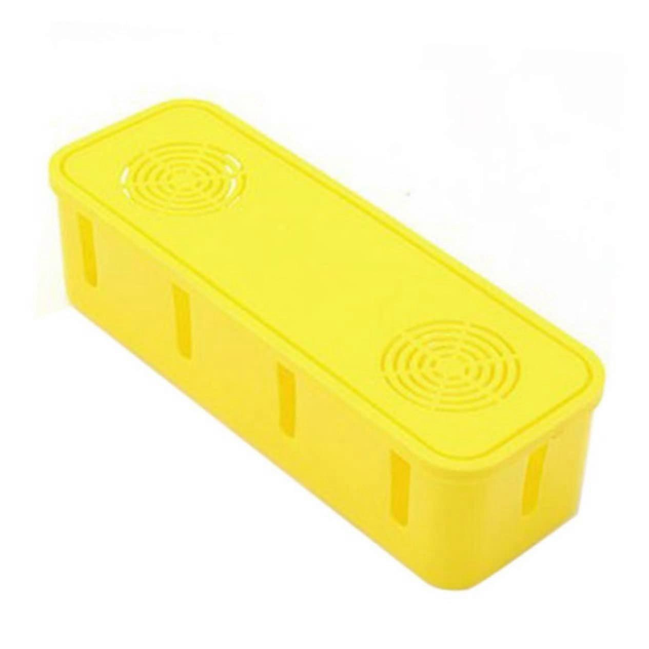 Cable management box for sockets, organizer in yellow for storing cables.
