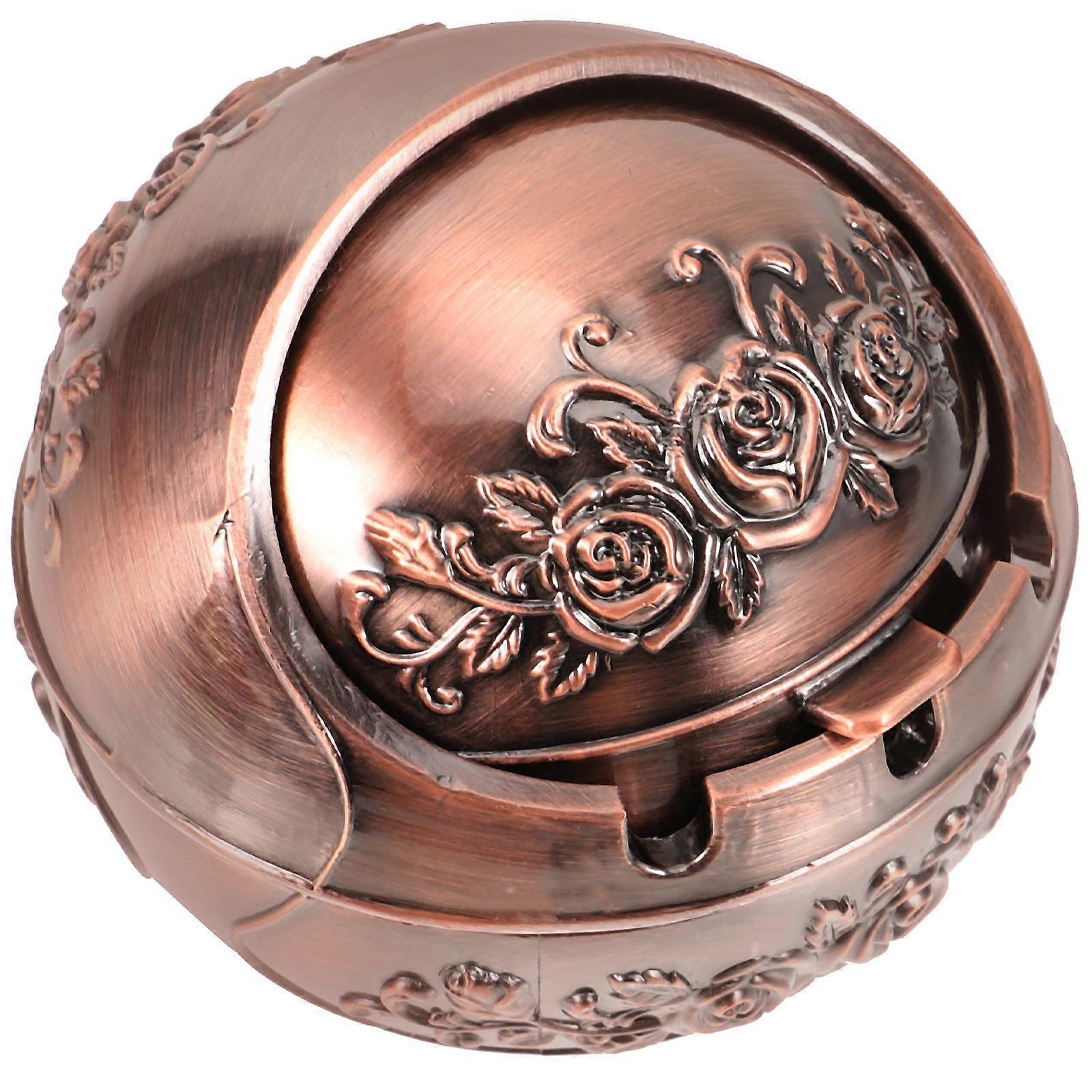 The **Vintage Rose Ball Lidded Ashtray** is a decorative and functional desktop accessory designed to add a touch of retro charm to your home or