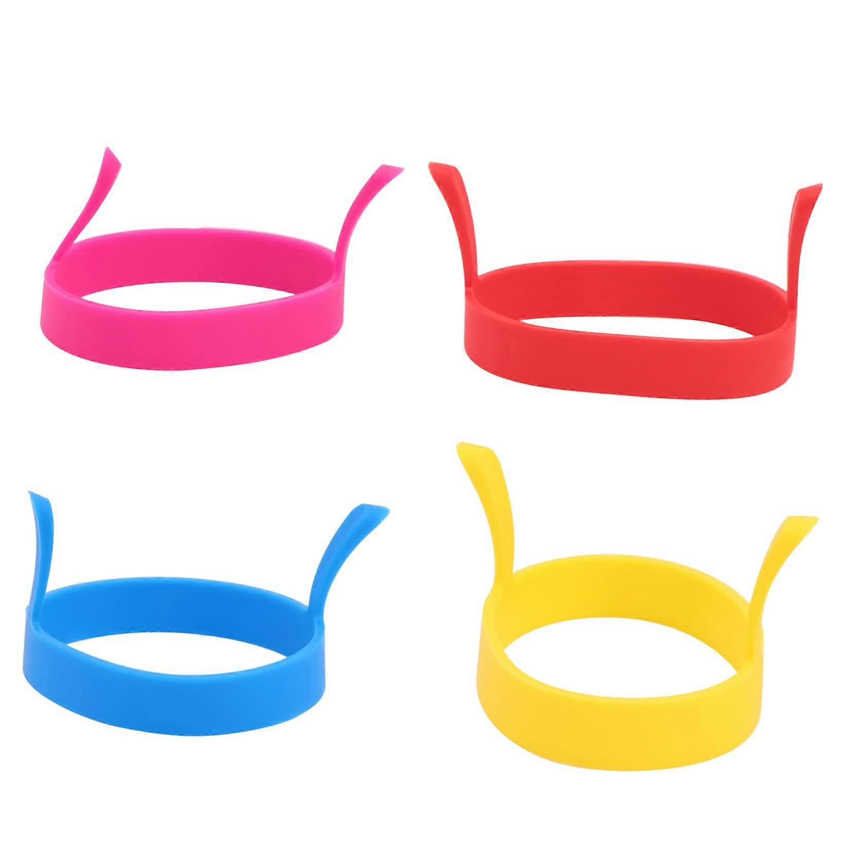 Round silicone mold for eggs 4 colors with handle heat resistant up to 230°C Ø approx. 7.5 cm