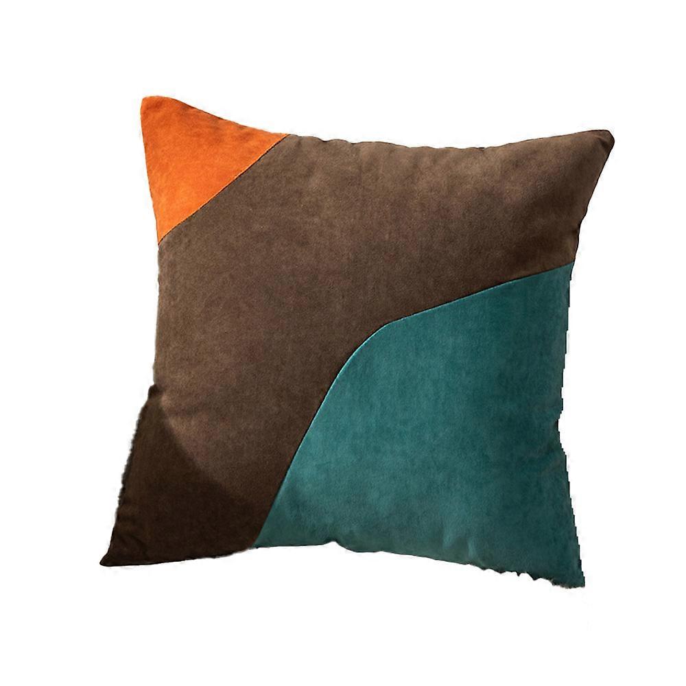 Square sofa cushion cover, featuring an irregularly spliced pattern in three distinct colors.