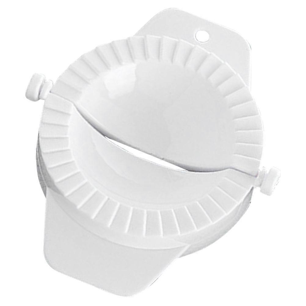 The **Manual Dumpling Maker Press Mold** is a handy kitchen tool designed to help you quickly and efficiently make dumplings, whether you're cooking