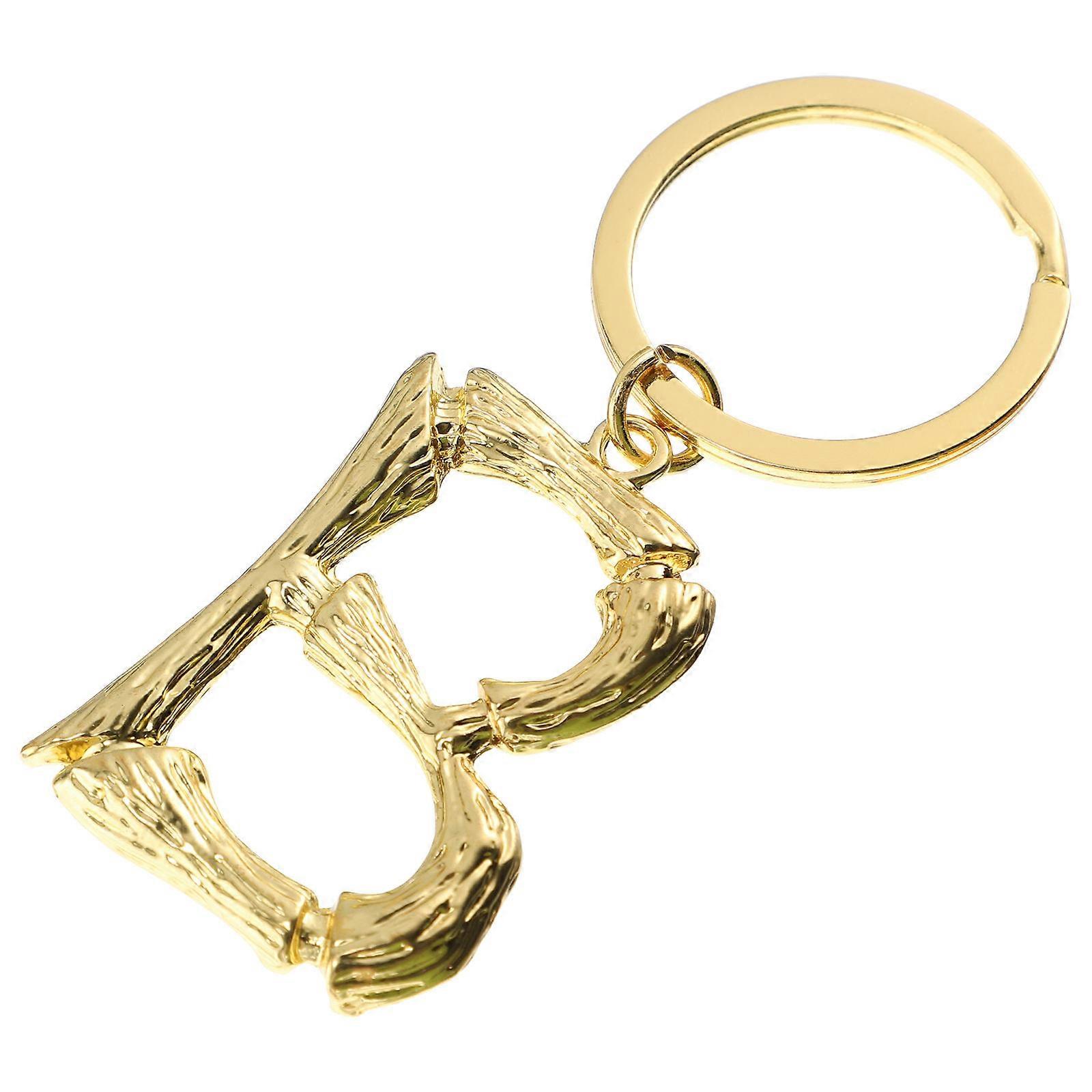 Here's a refined and appealing product description for the **Creative Alphabet Letter Key Ring Multi Functional Hanging Pendant**:

 

### 🎁