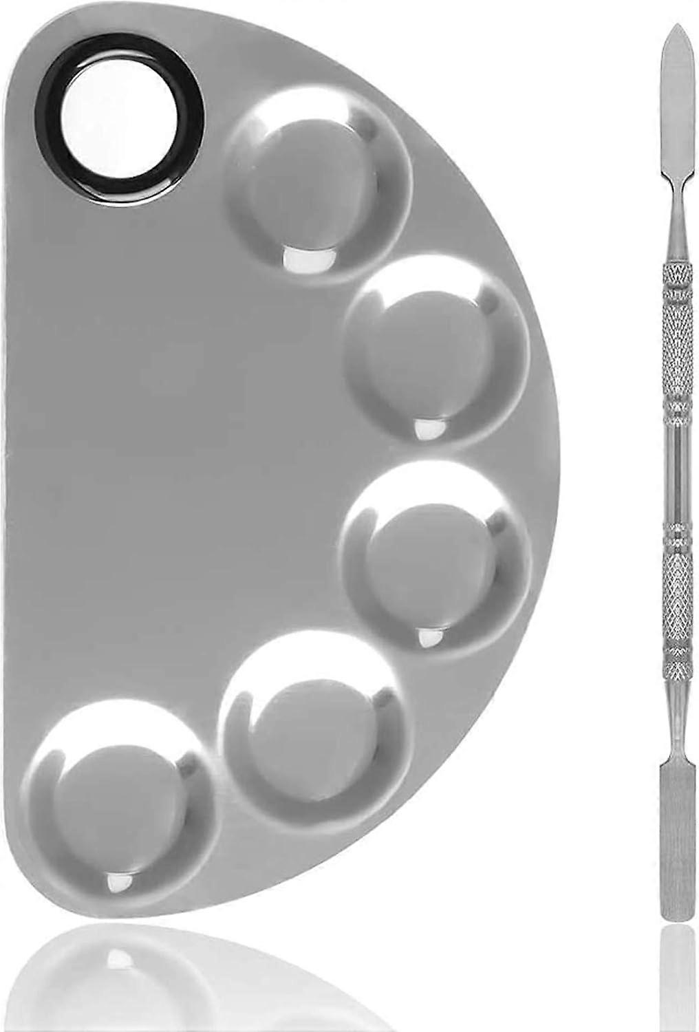 Makeup tools with eyeshadow spatula