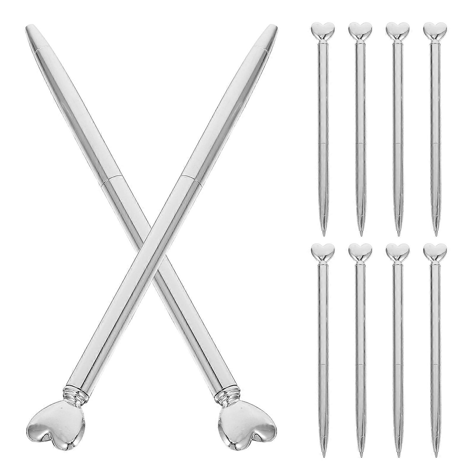a polished and professional product description based on your input:
**10pcs Heart Shaped Metal Retractable Ballpoint Pens – Cute Multi Function
