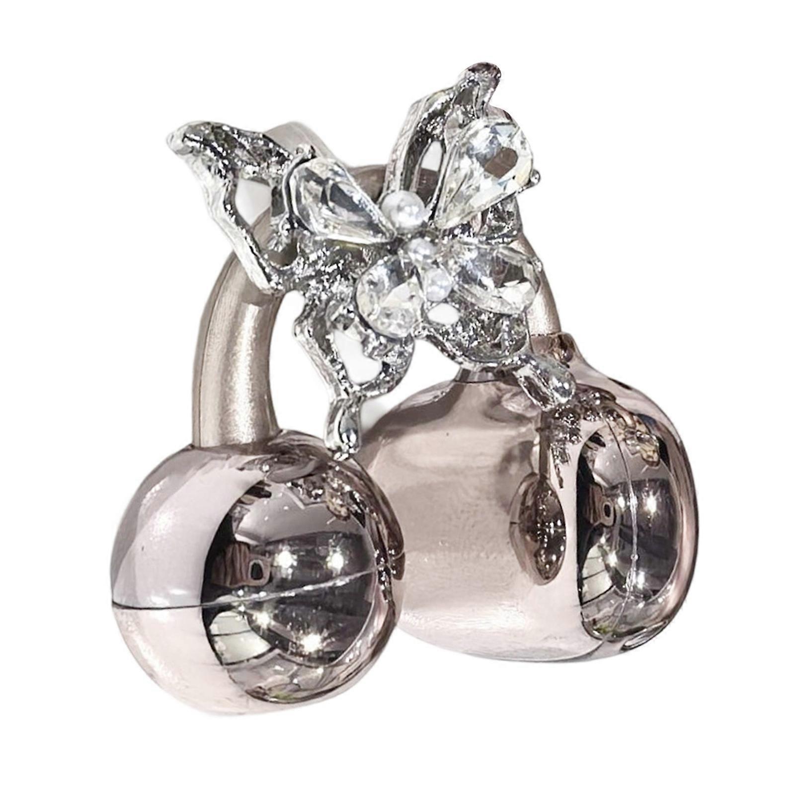 Accessoire pour écouteurs avec nœuds en cristal scintillants : clip élégant et détachable pour un style d'écouteurs personnalisable, multicolore.