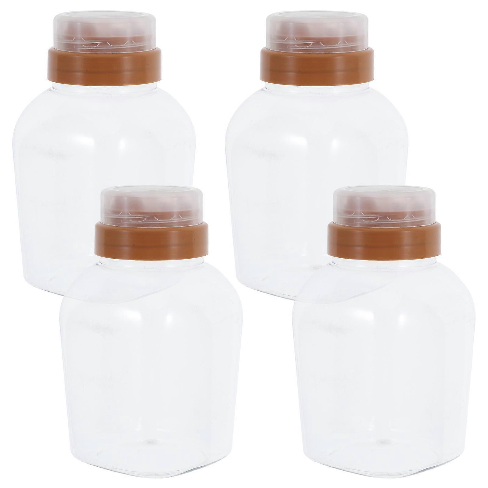 Clear Plastic Honey Bottles with Lids 4 Pack Refillable Leak Proof Squeeze Dispensers for Honey, Jam, and Spices Durable Kitchen Storage