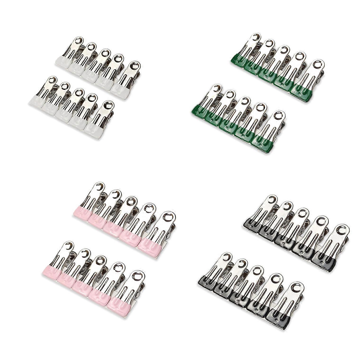 40 wasknijpers (wit + smaragd + roze + zwart)