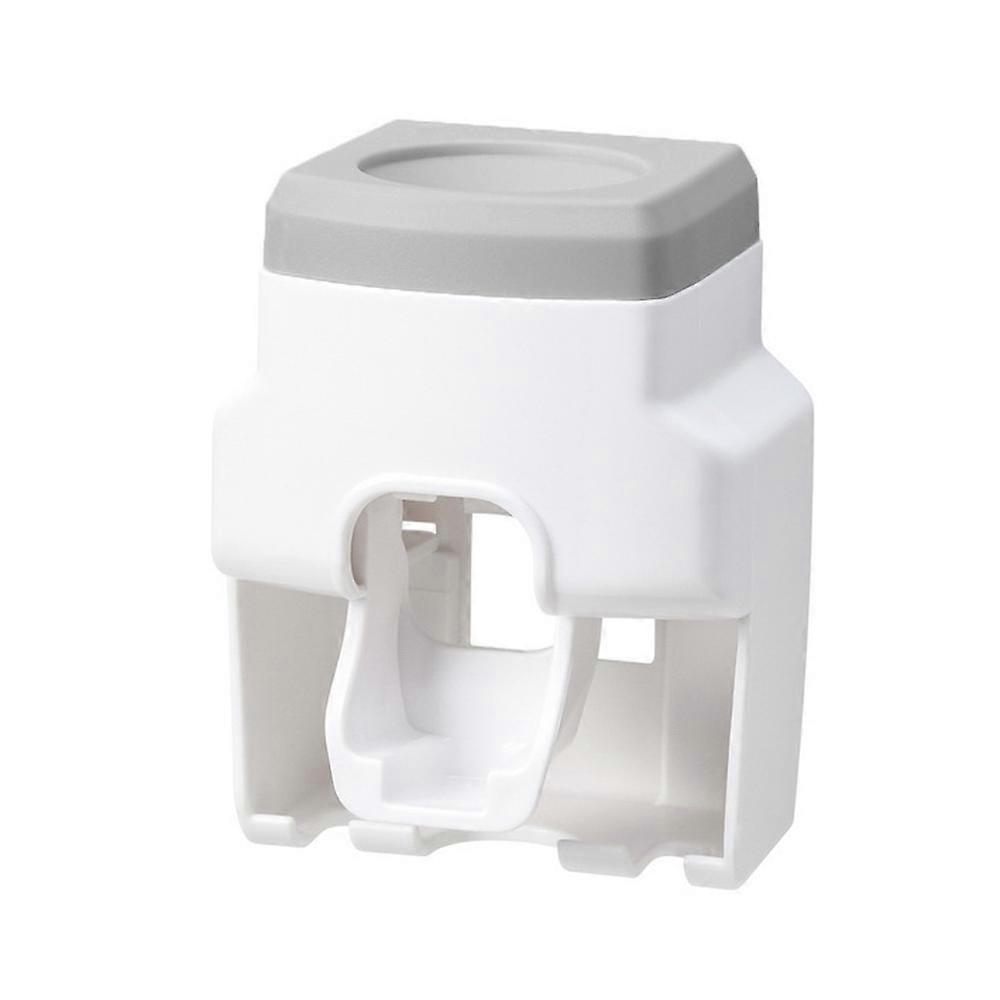 Fully automatic toothpaste squeezing toothbrush holder, made of ABS