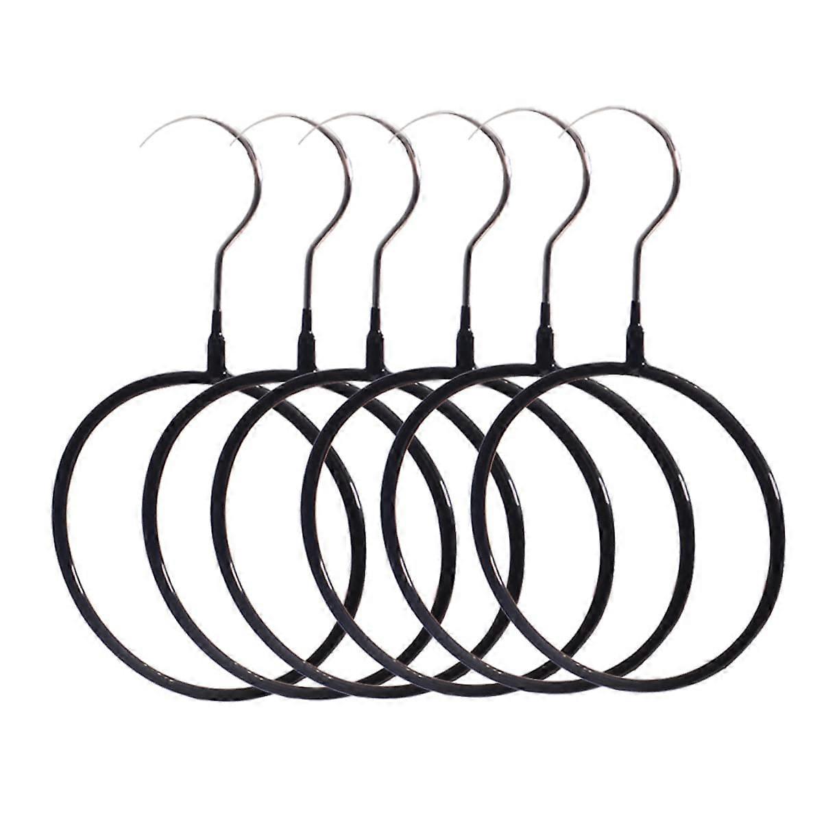 5 pieces of multipart clothes hangers for ties, belts, and scarves with sturdy rings for optimal storage.