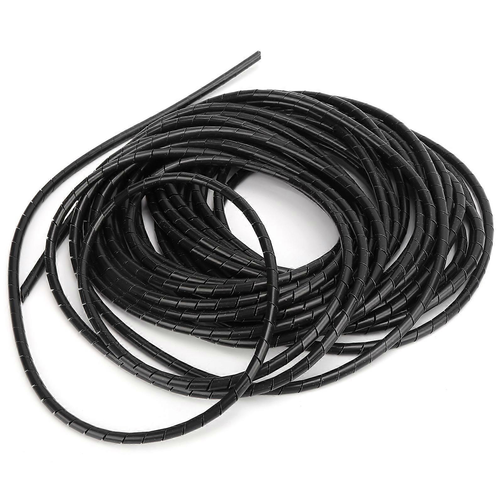 Flexible spiral cable organizer, black, for computer room.