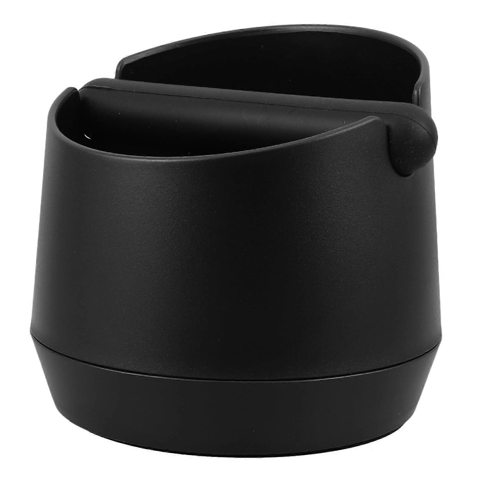 Coffee grounds container made of noisereducing, dishwashersafe material